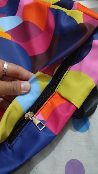 Mochila Poaba multicolor antirrobo
