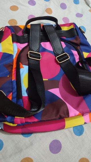 Mochila Poaba multicolor antirrobo