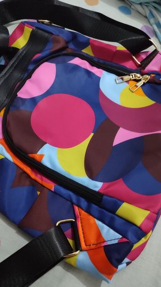 Mochila Poaba multicolor antirrobo