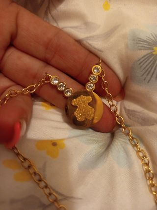 Colgante acero dorado con cristales