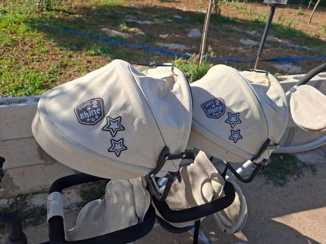 Triciclo gemelar para bebés