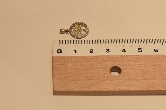 COLGANTE DE ORO 18K/0.8Gr