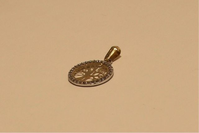 COLGANTE DE ORO 18K/0.8Gr