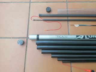 Caña de pescar enchufable.