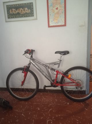 Bicicleta montaña doble suspensión