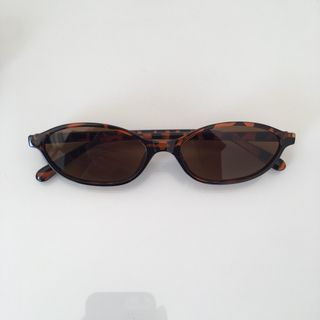 Gafas de sol ovaladas marrones