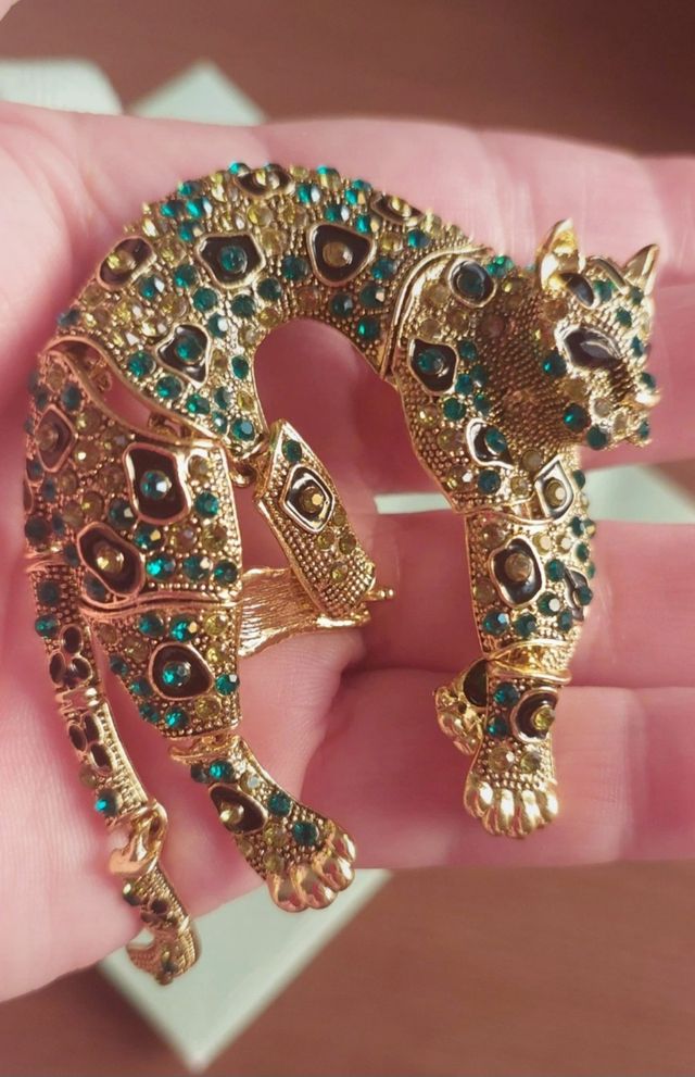 Broche pantera pedrería turquesa