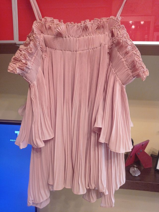 Blusa rosa plisada