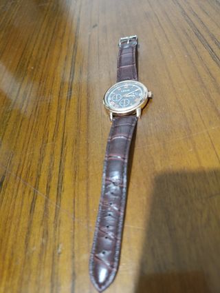 Reloj Wave marrón y dorado