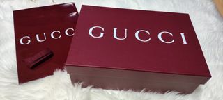 Caja y bolsa Gucci 