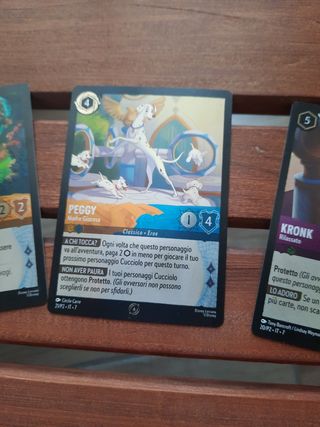 Lorcana: 3 carte promo (Biancaneve, Peggy e Kronk)