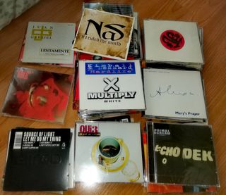 66 CDs en Version Singles de los 90