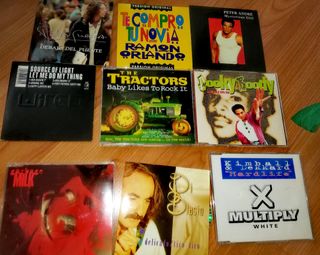 66 CDs en Version Singles de los 90