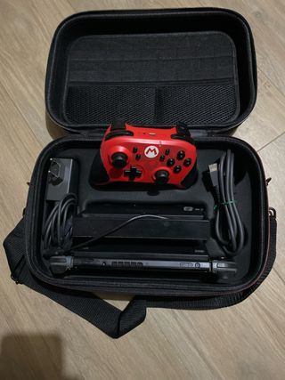 Nintendo Switch + funda + mando+ juegos