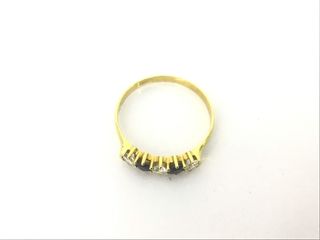 anillo oro 18k con piedra con circonita,zafiro