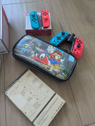 Nintendo Switch + juegos y mandos