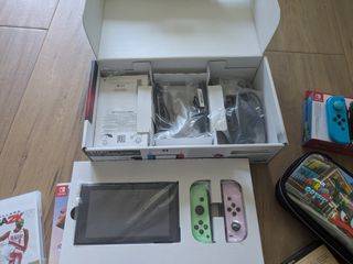 Nintendo Switch + juegos y mandos