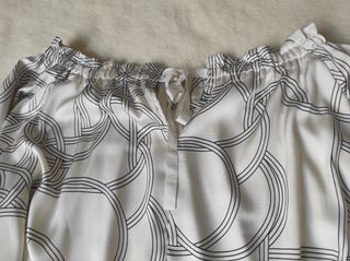 Blusa beige estampada