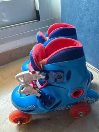 Patines Oxelo azules y rojos