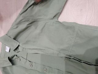 Camisa verde explorador niño