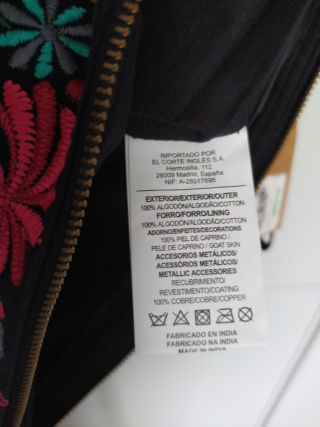 Bolso de pulsera El Corte Inglés negro con bordado