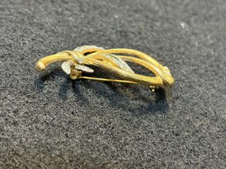 Broche vintage dorado años 60