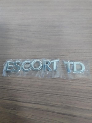 Emblema Ford Escort VII Hatch (GAL,AFL) (1