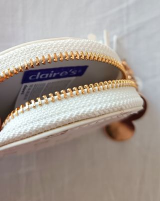 Monedero Claire's - dorado y blanco