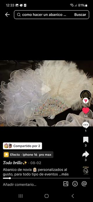Abanico plumas blanco plata