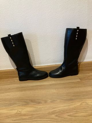 Botas negras niña