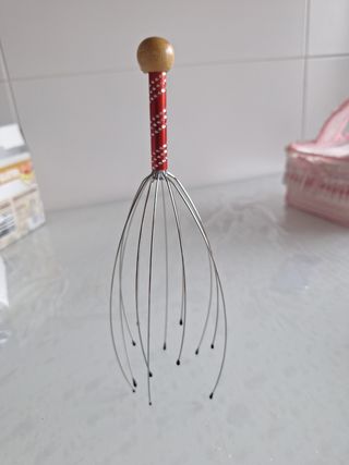 Masajeador craneal metálico, cabeza