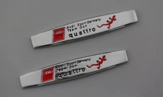2 EMBLEMAS LOGO CROMADO AUDI SLINE LAGARTO