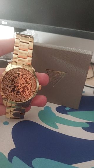 Reloj dorado guess hombre