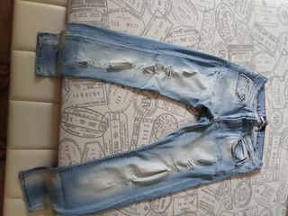 Jeans strappati blu