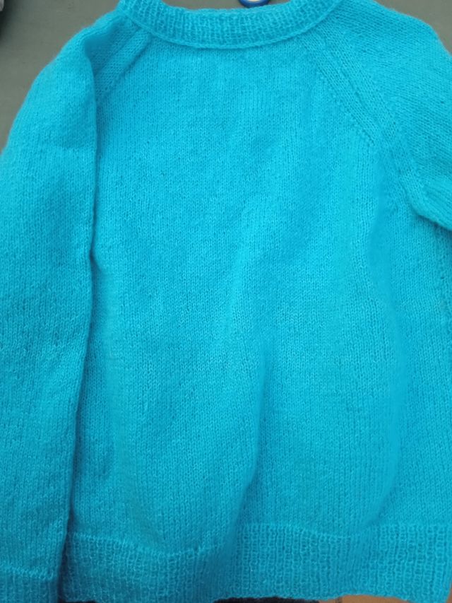 Jersei turquesa tejido a mano
