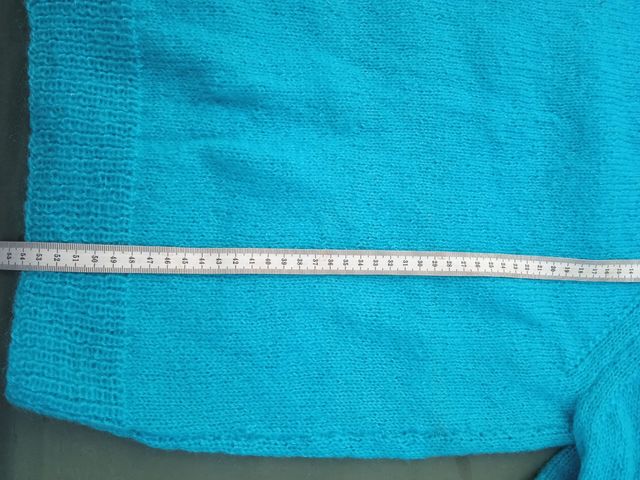 Jersei turquesa tejido a mano