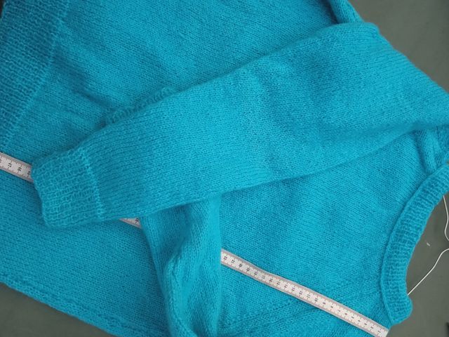 Jersei turquesa tejido a mano