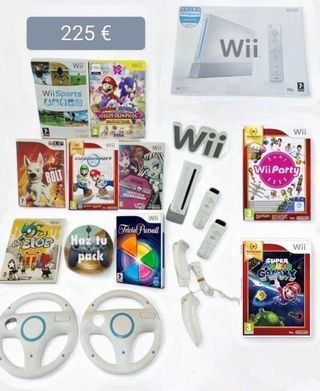 Wii con su caja + mandos + juegos + accesorios