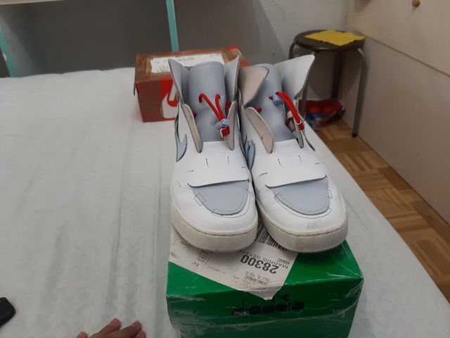 Zapatillas Nike blancas y azules - 35