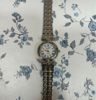 Reloj Cartier dorado y plateado