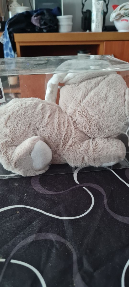 Muñeco calientacama gris