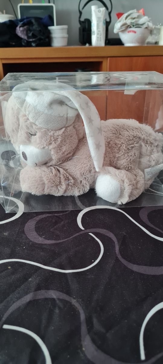 Muñeco calientacama gris