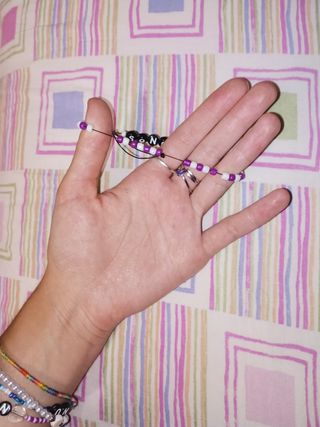 Braccialetto fatto a mano viola e bianco