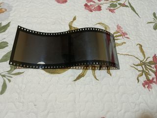 Portafotos rollo fotográfico Y otro de cristal.