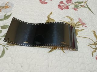 Portafotos rollo fotográfico Y otro de cristal.