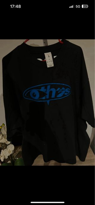 Camiseta Nike negra y azul