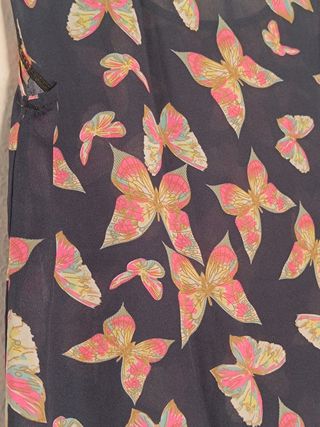 Blusa azul marino mariposas