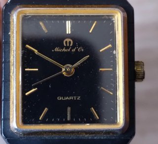 Reloj Michael d'or negro y dorado