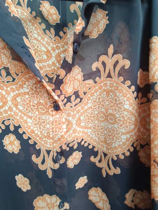 Blusa vintage negra y naranja