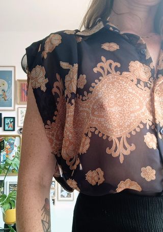 Blusa vintage negra y naranja